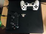 PlayStation 4 pro with 2 controllers