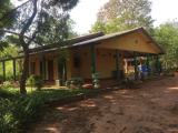 Land with house for sale